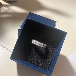 Sterling silver infinity band with Moissanite stones